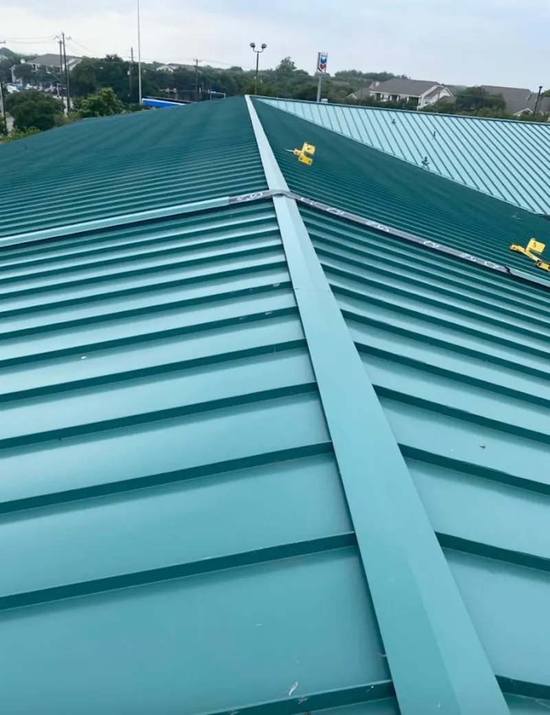Green commercial metal roof ridge and valley for Metal Roof Repair in Orland Hills