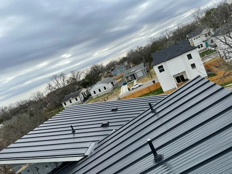 Standing seam metal roof panels with vents for Skylight Repair in Orland Hills